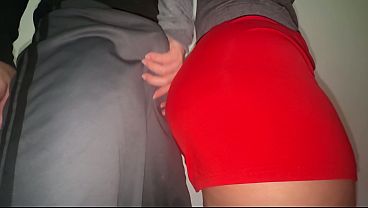 She grabs the stranger's cock.